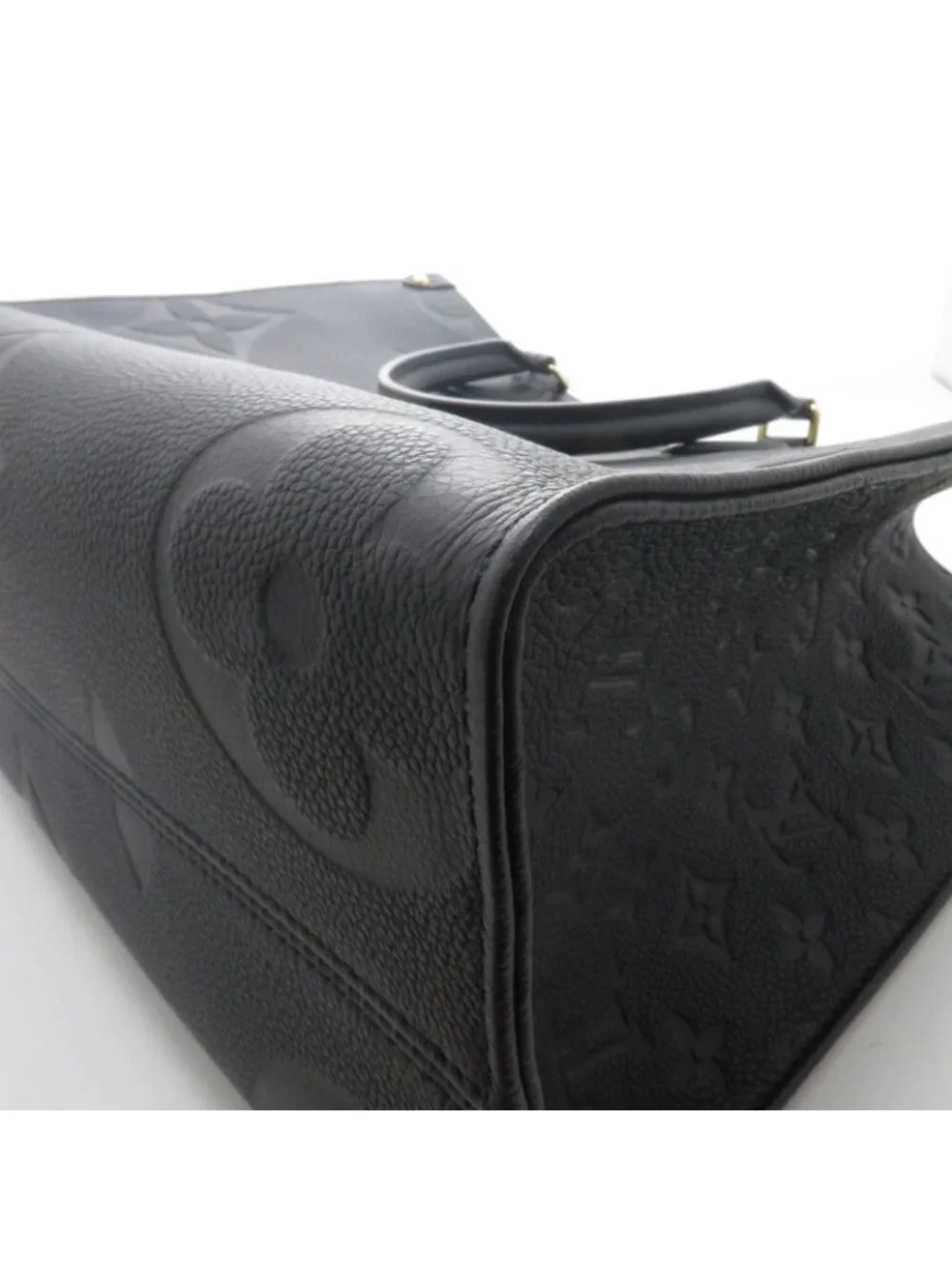 Louis Vuitton on the Go MM Monogram Empreinte Noir Tote Tag Stamp